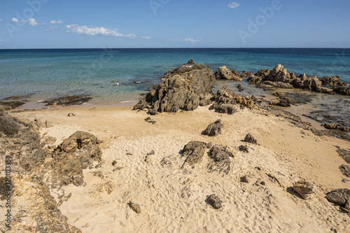Fototapeta Naklejka Na Ścianę i Meble -  Beautiful beach in Chia, in Southern Sardinia, with white sand and transparent and turquoise water