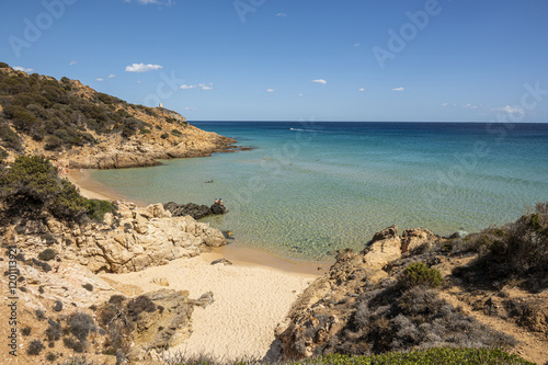 Fototapeta Naklejka Na Ścianę i Meble -  Beautiful beach in Chia, in Southern Sardinia, with white sand and transparent and turquoise water