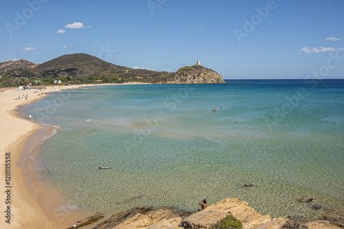 Fototapeta Naklejka Na Ścianę i Meble -  Pula, Italy - 09-10-2024: Beautiful beach in Chia, in Southern Sardinia, with white sand and transparent and turquoise water