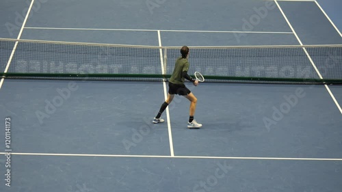 Professional Tennis Player in Action During Match