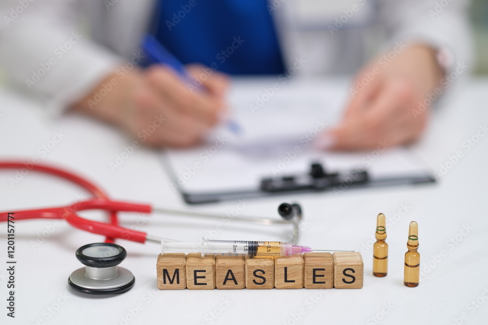 A doctor carefully documents the measles vaccination process, noting the syringes and vials used throughout