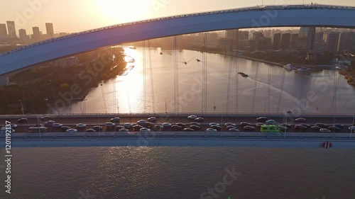 4K Real Time Aerial view of Lupu bridge and Huangpu River in Shanghai at sunset, China