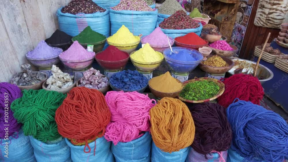 Africa, Morocco, Marrakech walking in the traditional suk, souk market inside the Medina in Jemaa el fna square heritage world , tourist attraction destination, 
colored wool hanging to dry