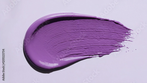 A vibrant purple smudge or smeared texture, possibly of paint or cosmetic product. It's prominently placed against a white background, with the smudge extending outwards in a semi-circular shape