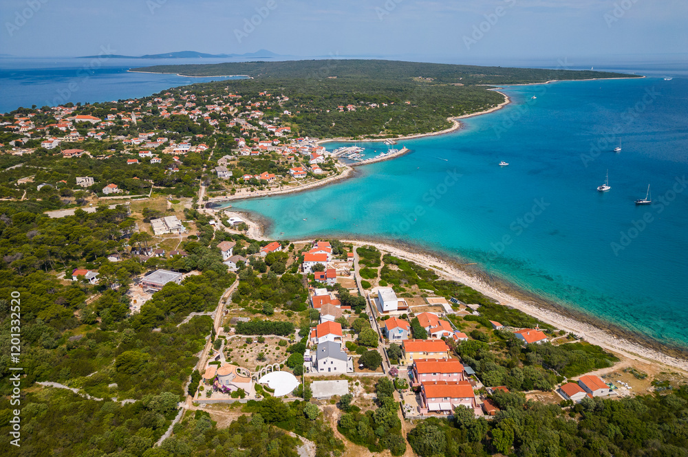 Obraz premium Aerial drone view of Croatian island Silba with beautiful beaches. Amazing Adriatic sea tourist vacation destination in Croatia. Panoramic paradise blue sea, sandy beaches, old houses and boats