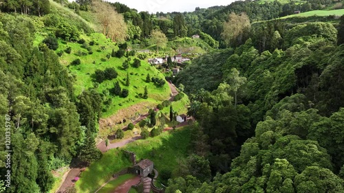 Lush scenic terrain of Ribeira dos Caldeiroes natural park on Sao Miguel. Drone photo