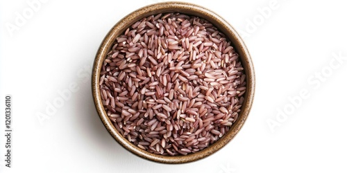 Boiled riceberry rice in a round brown bowl atop a white background featuring shades of purple with a top view angle showcasing the texture. photo