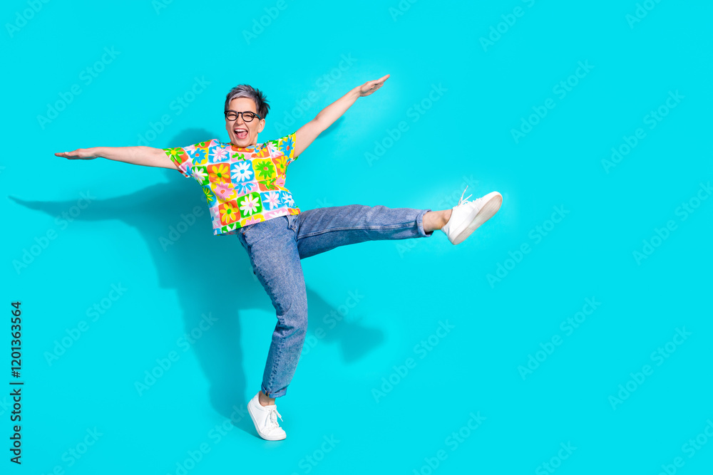Full size photo of nice aged woman dance empty space isolated on teal color background Full size photo of nice aged woman dance empty space isolated on teal color background