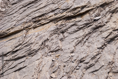 Layered rock in the Swiss Alps as background