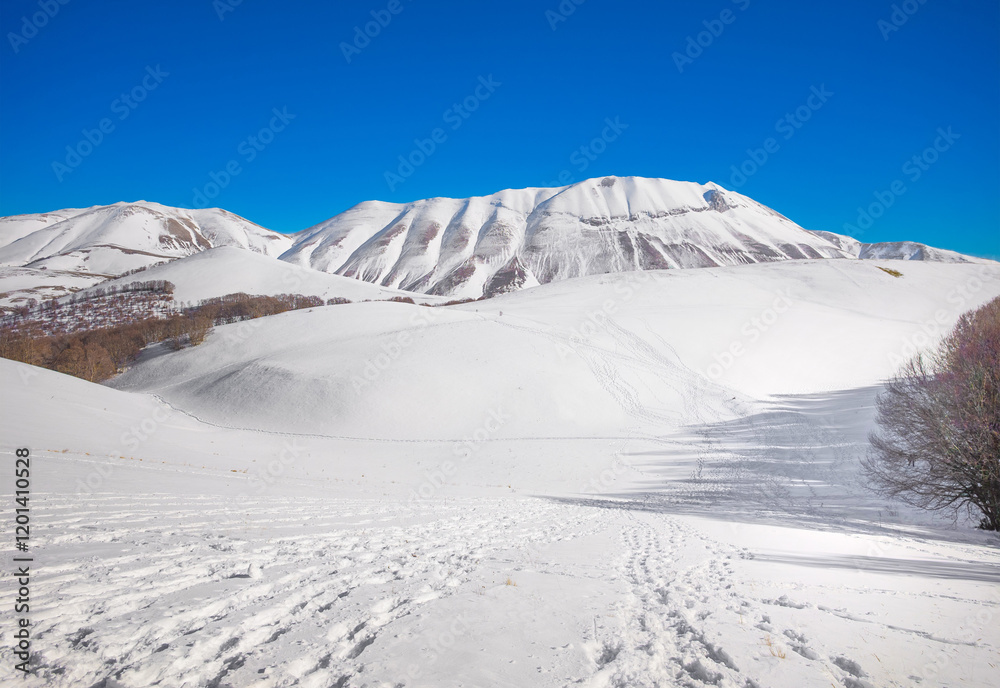 Monti Sibillini (Italy) - The landscape summit in Marche and Umbria region, municipal of Montemonaco, Amandola and Norcia. Sibillini panoramic winter landmark, alpinistic with snow