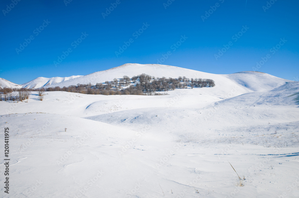 Monti Sibillini (Italy) - The landscape summit in Marche and Umbria region, municipal of Montemonaco, Amandola and Norcia. Sibillini panoramic winter landmark, alpinistic with snow