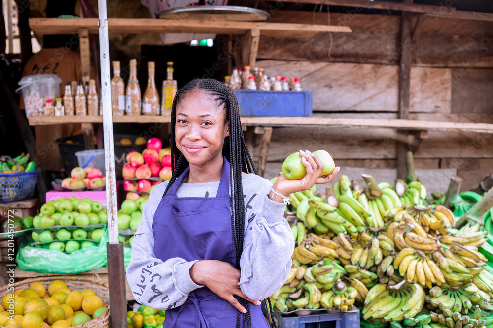 Obraz premium A happy female market vendor proudly showcasing fresh organic fruits and vegetables at a vibrant local market. Capturing the essence of small business, and a lively marketplace environment.
