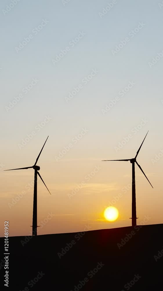 Wind power plant towers in mountains at sunset.Windmill farm. Sustainable energy production. Green energy, clean power, clean energy concept.
Wind power plant towers in mountains at sunset.Windmill farm. Sustainable energy production. Green energy, clean power, clean energy concept.