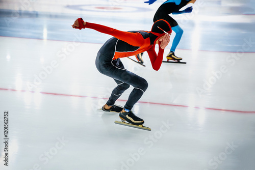 rivalry two young skaters at speed skating competition
