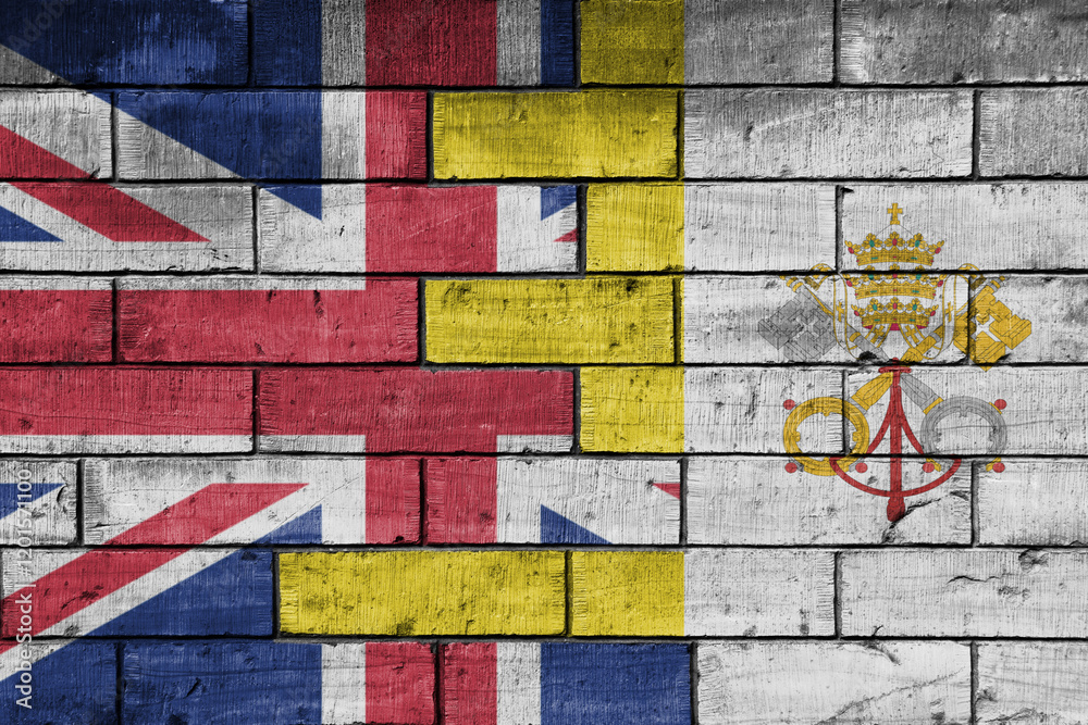 Fototapeta premium colourful painted big flag of great britain and flag of vatican city on a massive old brick wall background. concept