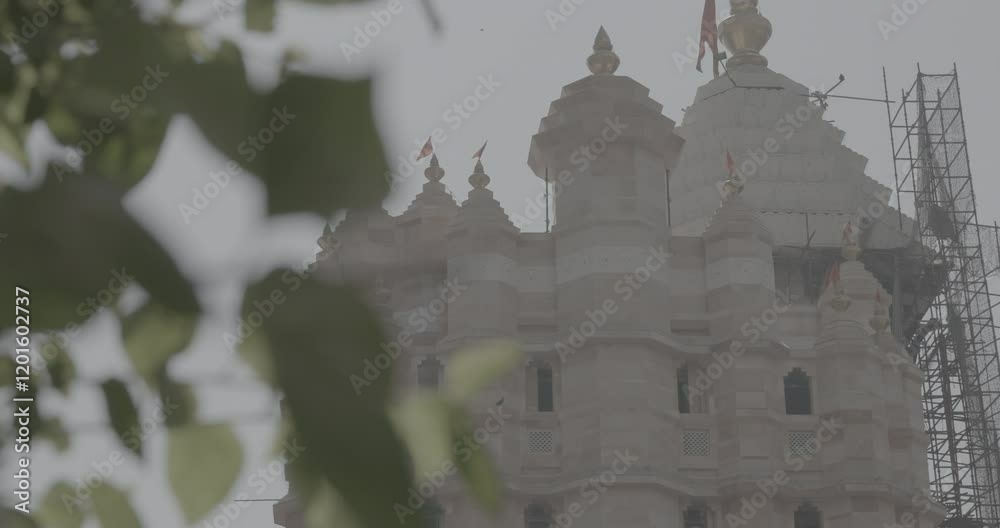 Mumbai, India. Ungraded C LOG 2 Siddhivinayak Or Siddhi Vinayak Temple. Shri Siddhivinayak Ganapati Mandir Is Hindu Temple Dedicated To Ganesha. Pigeon Fly In Slow Motion. Located In Prabhadevi