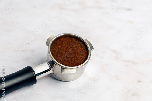 Portafilter with ground coffee  photo