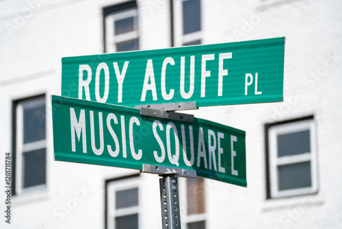 Street signs at the intersection of Roy Acuff Place and Music Square East in Nashville, Tennessee in a urban setting during daylight