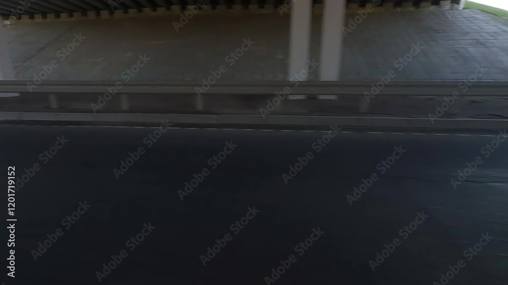 Bridge, roadside and road asphalt, green trees and blue sky Bridge, roadside and road asphalt, green trees and blue sky