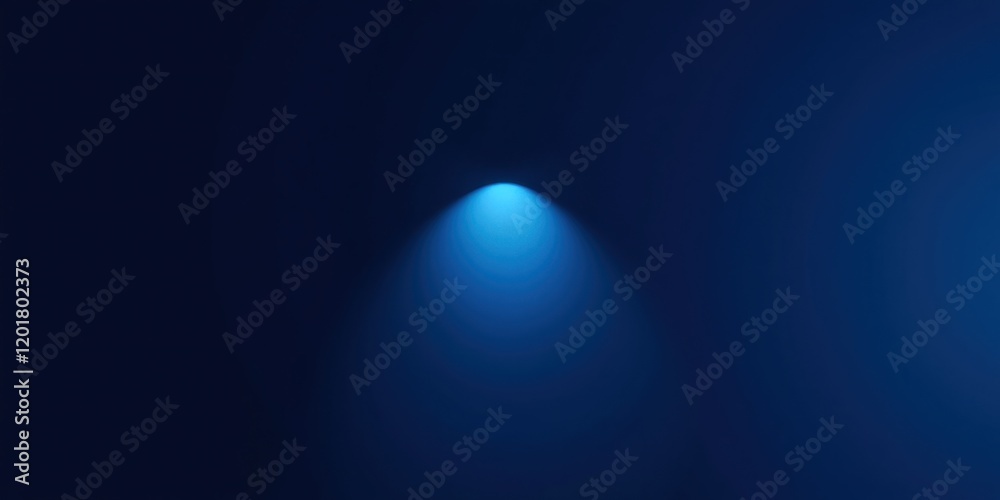 A solitary beam of light pierces the darkness, casting a luminous circle against the deep blue backdrop. A solitary beam of light pierces the darkness, casting a luminous circle against the deep blue backdrop.