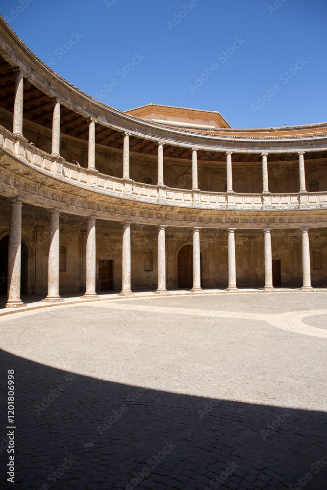 Obraz premium Central square of the Palace of Charles V located in Granada, Spain. It is a Renaissance building inside the Alhambra, a former Nasrid palace complex.