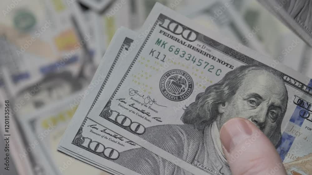 Counting Cash A Detailed Look at Hands Holding Dollar Bills Clearly in Focus Here Counting Cash A Detailed Look at Hands Holding Dollar Bills Clearly in Focus Here