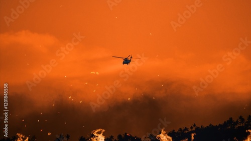 Firefighting helicopter battles flames in Los Angeles during wildfires of 2025 photo