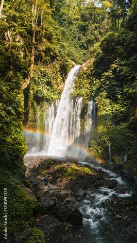 Scenic view of Tiu Kelep Waterfall in Lombok with lush greenery