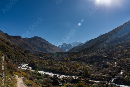 Himalayan Mountain Langtang Village to Kyanjin Ri trekking with Gangchenpo background in Nepal photo