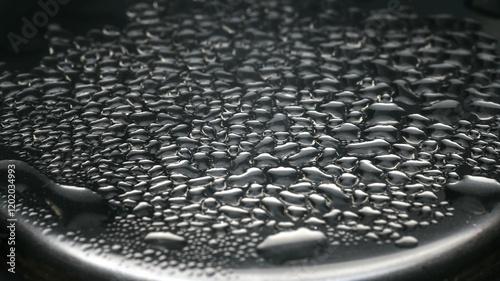 Water vapor condenses on metal surfaces