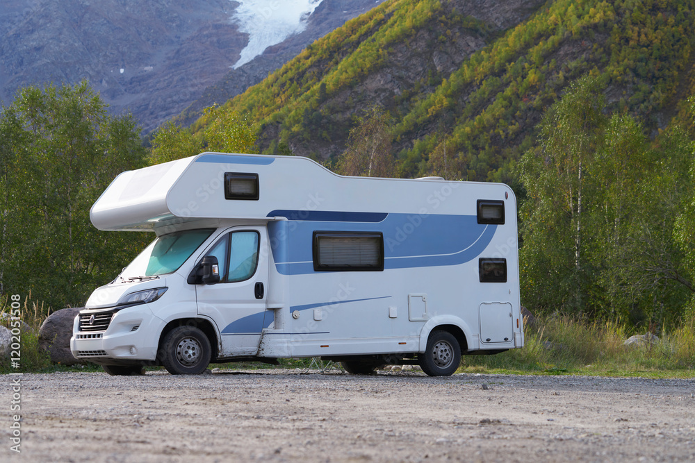 Autotravel to Prielbrus in autumn. Camper on a specially equipped site in a mountain gorge surrounded by picturesque nature. Autotravel to Prielbrus in autumn. Camper on a specially equipped site in a mountain gorge surrounded by picturesque nature.