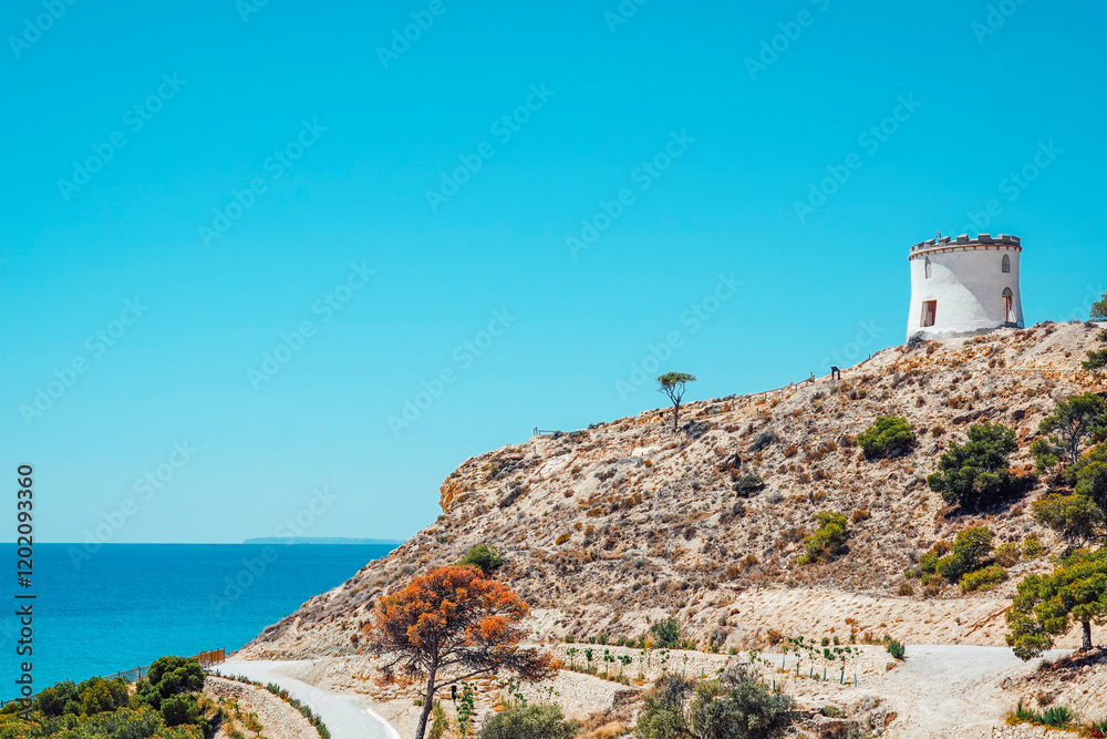 Fototapeta premium Beautiful Villajoyosa town in Spain. View to clifftop Malladeta in La Vila Joiosa to the Tower Malladeta