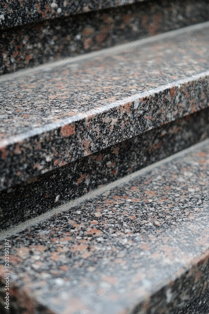Closeup view of granite stairs, showcasing intricate patterns and textures. A stunning architectural detail. Closeup view of granite stairs, showcasing intricate patterns and textures. A stunning architectural detail.