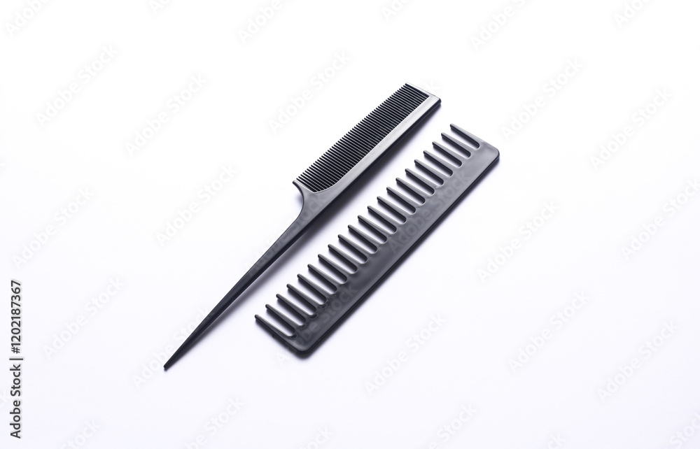 Set of black plastic combs on white background Set of black plastic combs on white background