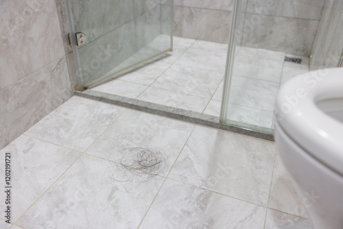 Obraz na płótnie Loose hair strands on shower floor w salonie