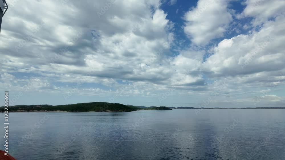 Dark clouds gather at the horizon, adding drama to the vast ocean view.
Dark clouds gather at the horizon, adding drama to the vast ocean view.