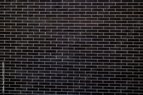 Obraz na płótnie Black brick wall. Concept: Building, architecture, pattern, black brick. w salonie