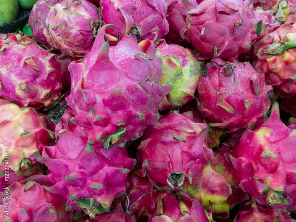 Obraz premium Vibrant Pink Dragon Fruit Pile A CloseUp Lush Still Life