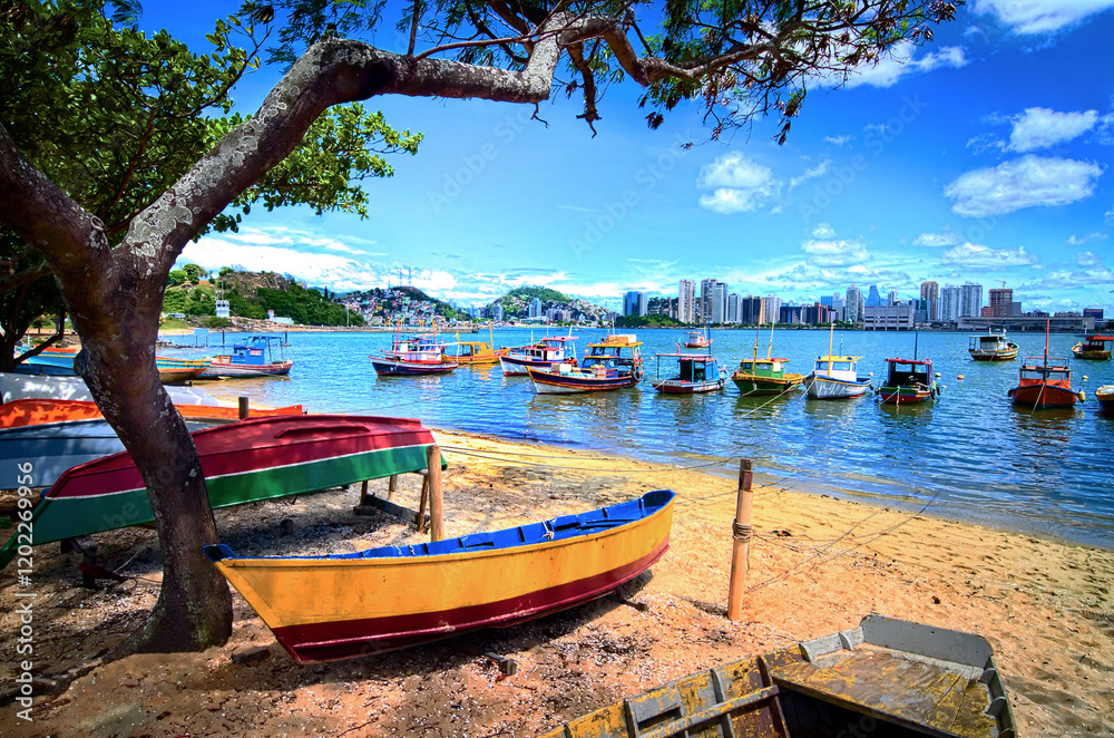 Wooden fishing boats parked on the shore. Fishing boats moored waiting to be used on a beautiful sunny day. Wooden fishing boats parked on the shore. Fishing boats moored waiting to be used on a beautiful sunny day.