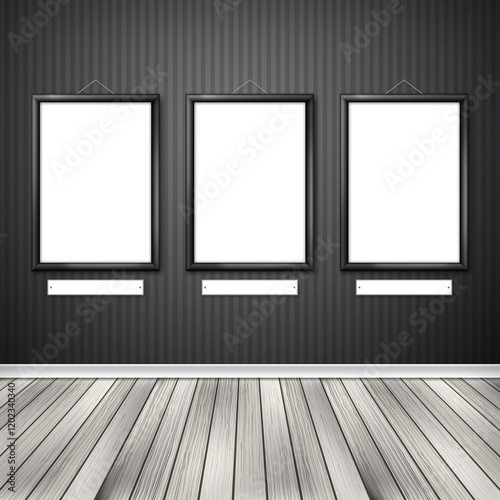 Gallery interior with three empty frames on wall.