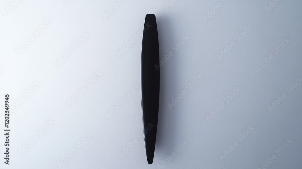 Black, slender, sleek object on white background. Black, slender, sleek object on white background.