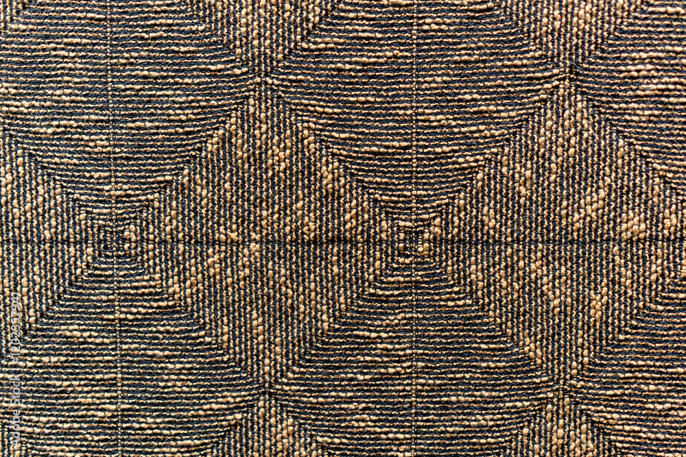 Fototapeta premium A patterned cloth with a brown and black color scheme
