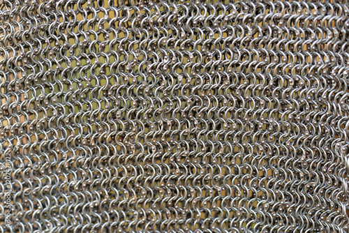 A close up of a metal chain with many small links