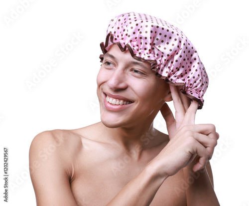 Happy man wearing pink shower cap on white background photo