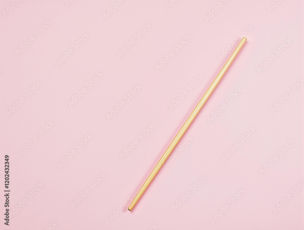 a single pair of chopsticks made of bamboo placed on a pastel pink solid background flat lay view a single pair of chopsticks made of bamboo placed on a pastel pink solid background flat lay view