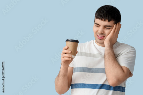 Young man with coffee cup s...