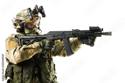 Equipped soldier in uniform aiming weapon during military operation