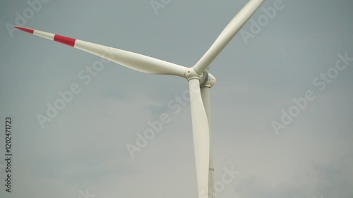 rotating blades of a wind generator close-up