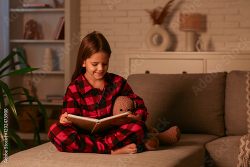 Little girl in red plaid pa...