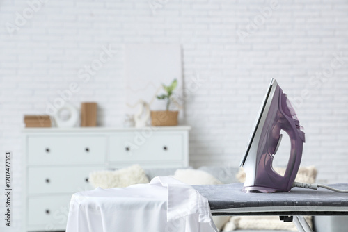 Electric iron and clothes o...